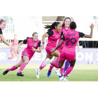 Lexington SC midfielder Kim Mendez celebrates her match-tying goal with her teammates