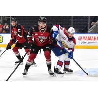 Vancouver Giants defenceman Marek Howell (center) vs. the Edmonton Oil Kings