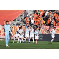 Atlético Ottawa celebrate Sam Salter's goal