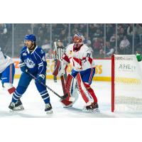 Syracuse Crunch's Joel Teasdale and Laval Rocket's Jakub Dobeš on game night