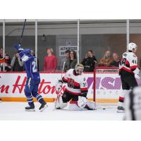 Syracuse Crunch forward Dylan Duke reacts after his goal against the Belleville Senators