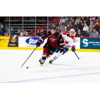 Vancouver Giants' Adam Titlbach battles the Spokane Chiefs' Hayden Paupanekis