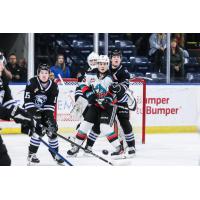 Jaxon Kehrig of the Kelowna Rockets fights for space against the Wenatchee Wild