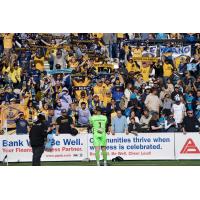 Rhode Island FC goalkeeper Koke Vegas applauds club supporters