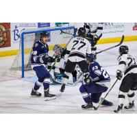 Worcester Railers' Cole Donhauser and Colin Jacobs battle Wichita Thunder's Nolan Kneen