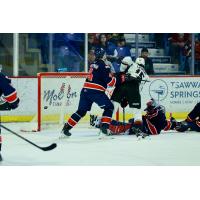 Vancouver Giants centre Jaden Lipinski creates traffic in front of the Regina Pats net