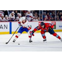 Springfield Thunderbirds defenseman Scott Harrington (right) vs. the Laval Rocket